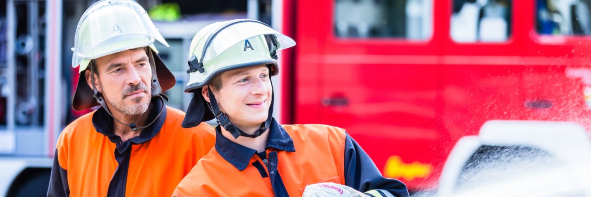 Men of the fire department extinguish fire